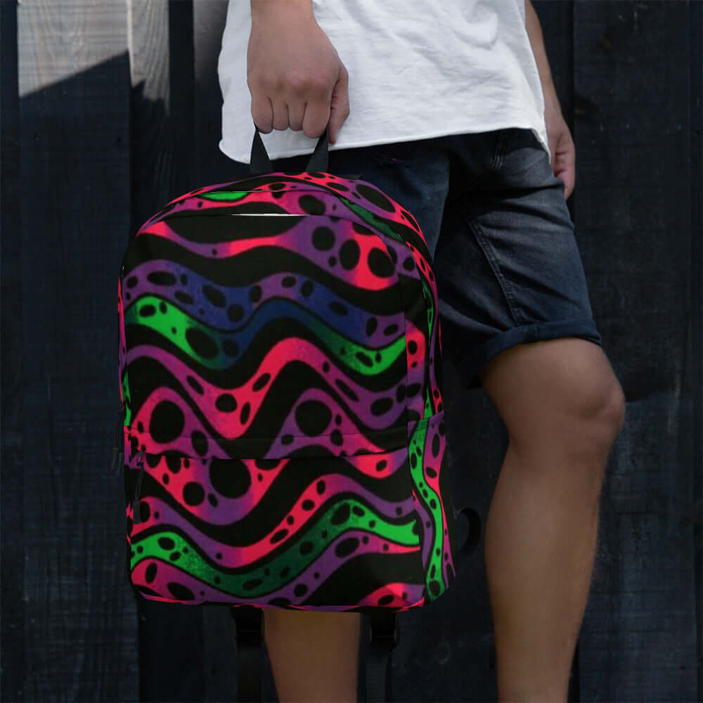 Mochila con diseño colorido y moderno, ideal para un estilo urbano y casual. MOCHILA. Diseño exclusivo con patrones vibrantes.