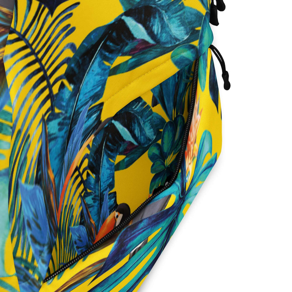 Mochila Tukan Urban Unisex con diseño tropical colorido y funcionalidad mejorada.