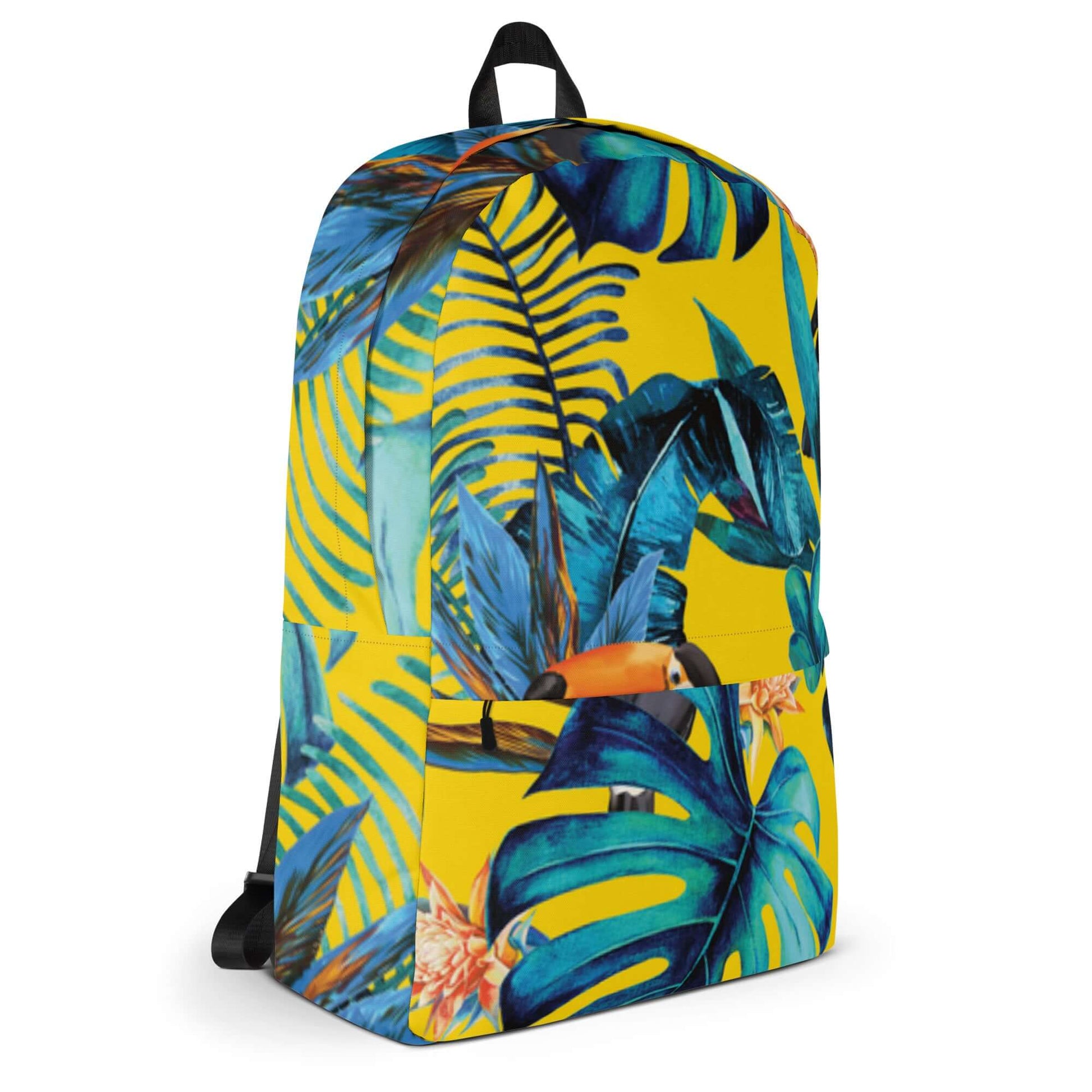 MOCHILA TUKAN URBAN UNISEX con diseño de hojas tropicales sobre fondo amarillo, ideal para el estilo streetwear.