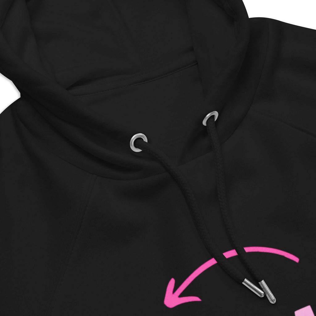 SUDADERA KARMA -UNISEX ¡Lo que das, vuelve!  fusiona el arte urbano con diseño negro y detalles en rosa.