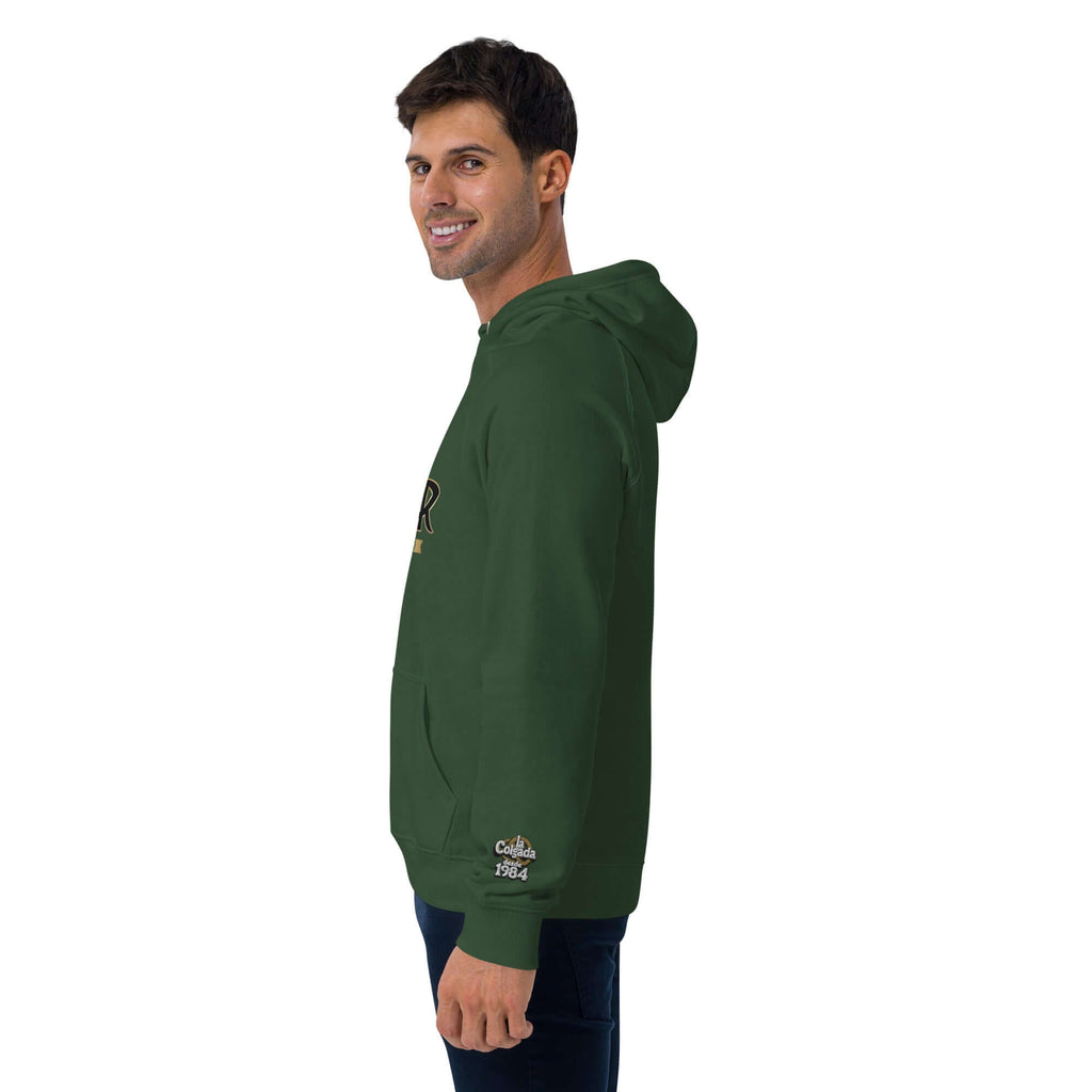Hombre sonriente vistiendo sudadera SUDADERA THOR con capucha unisex en color verde.